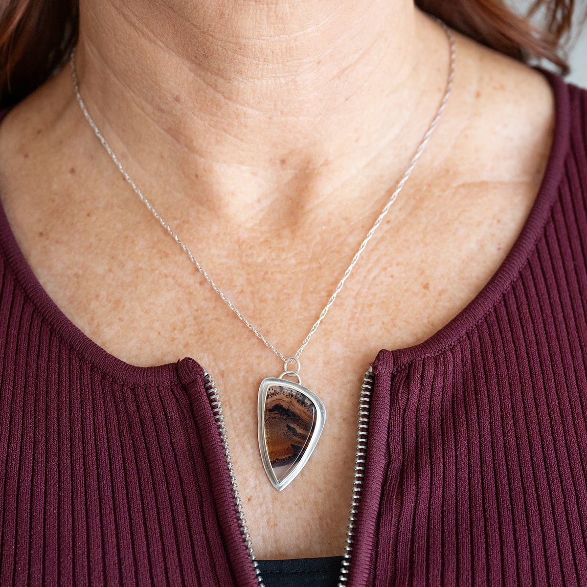 Laura wearing the Turquoise Butterfly Bliss and Sterling Silver Necklace and bracelet.