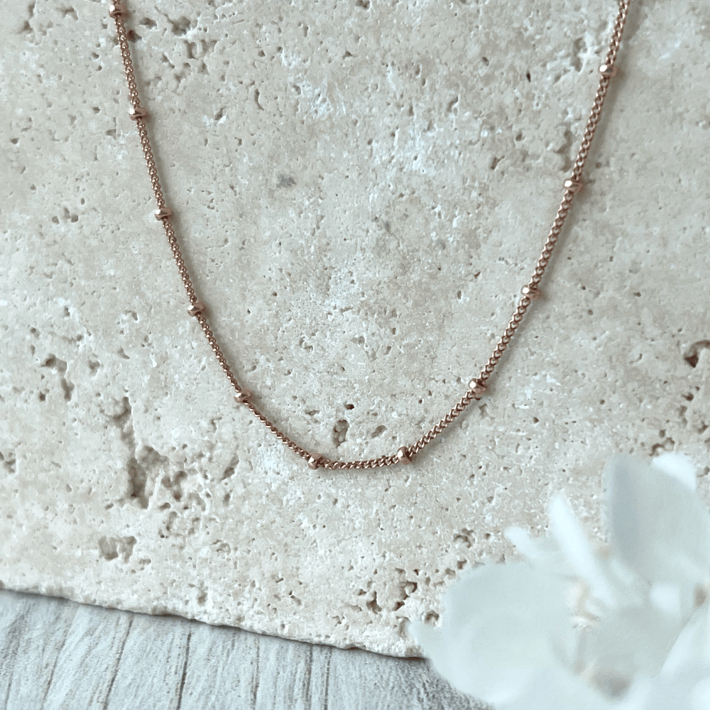 The necklace measures 18 inches, perfect for layering with other necklaces or wearing it alone for a more minimalist look. 