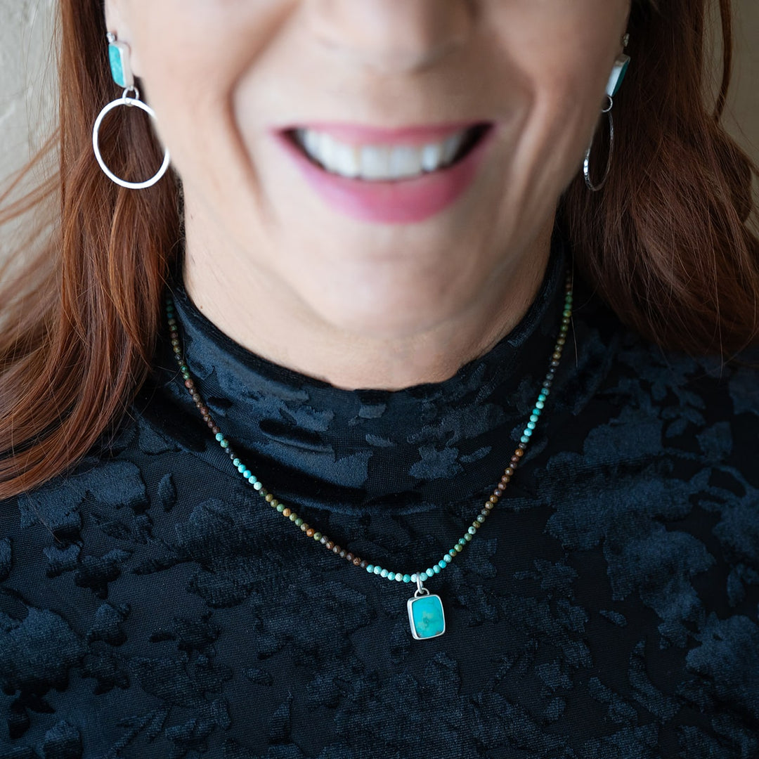 Turquoise Beaded Pendant Necklace worn with Turquoise Stud Hoops