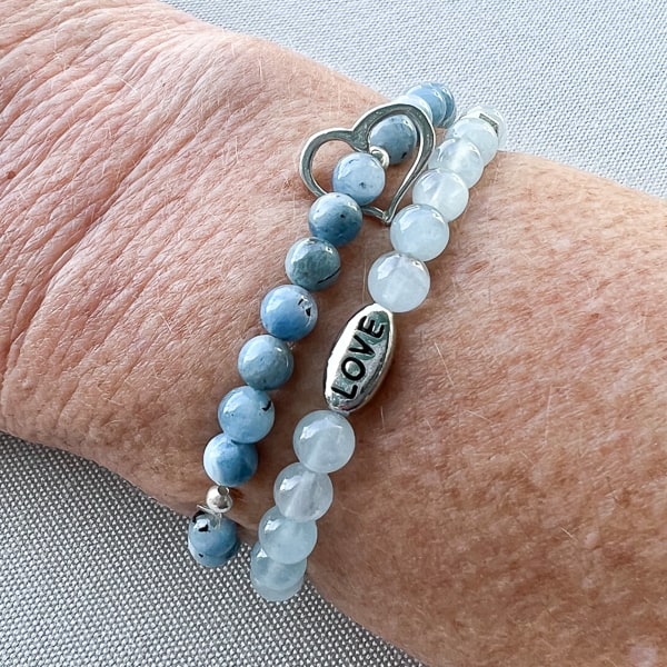 Ocean's Heart Bracelet worn with Love in the Waves Bracelet.